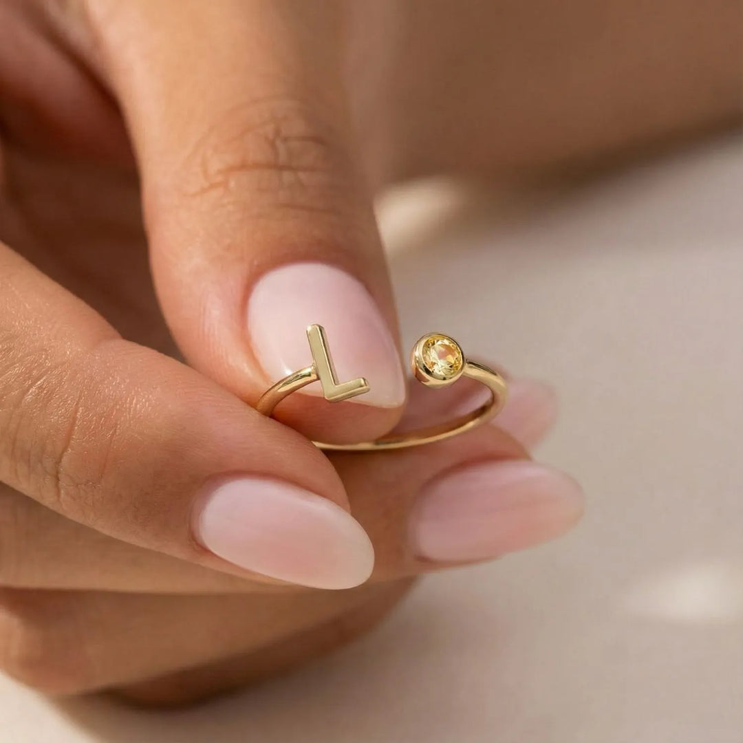 ANILLO CON INICIAL ABIERTO CON CIRCONITA