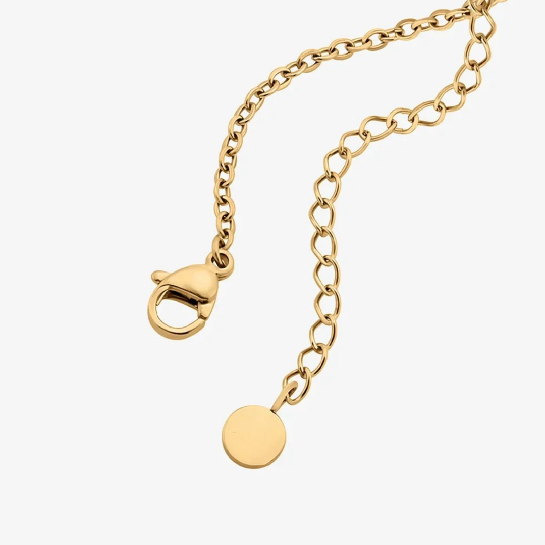 Collar de tenis con nombre personalizado de Auxana, muestra un diseño de collar con grabado de nombre en plata brillante.